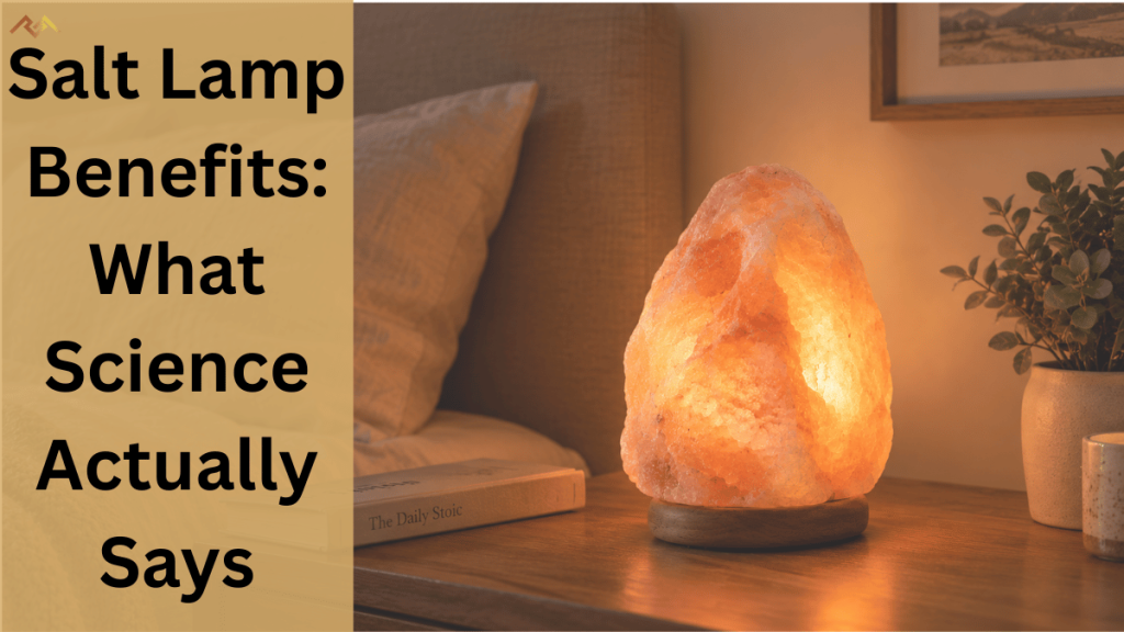 Himalayan salt lamp glowing warm amber on a wooden bedside table